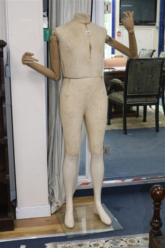 A modern articulated mannequin height 60in.